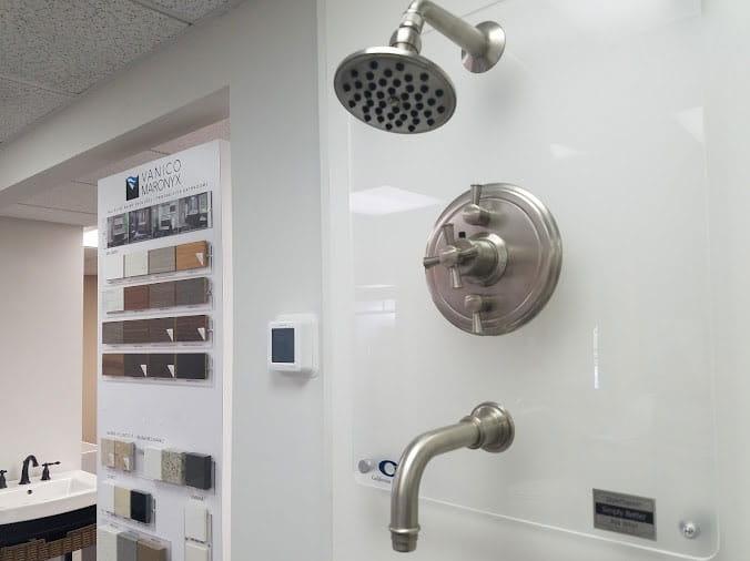 Shower head display at Peabody Supply Company Bath Showcase